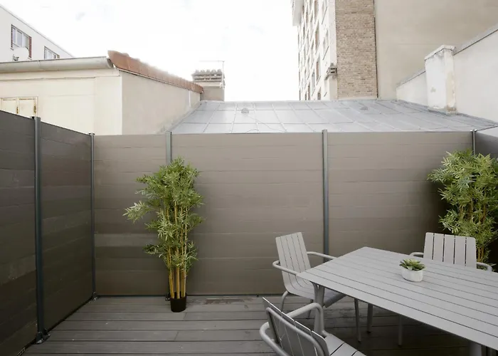 In A Designer With Private Terrace Apartment Paris